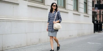 Modern American woman showcasing 2025 fashion trends in an urban setting
