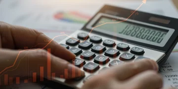 Financial calculator displaying numbers with Social Security statements and inflation graph